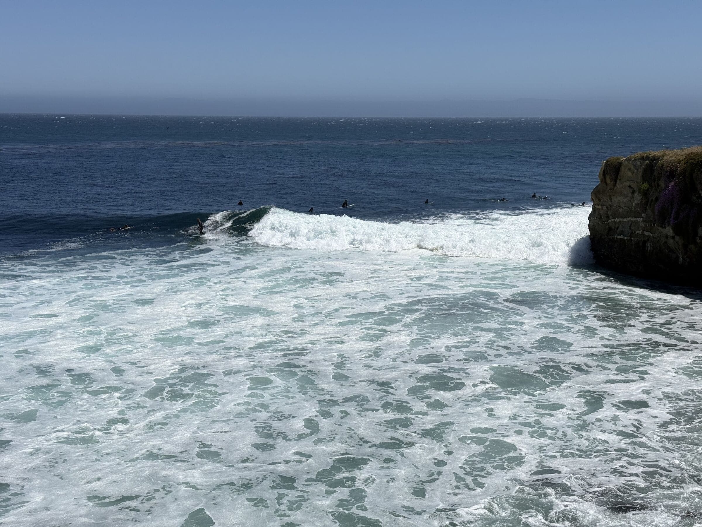 Churning whitewater surf below the cliffs at Steamer Lane